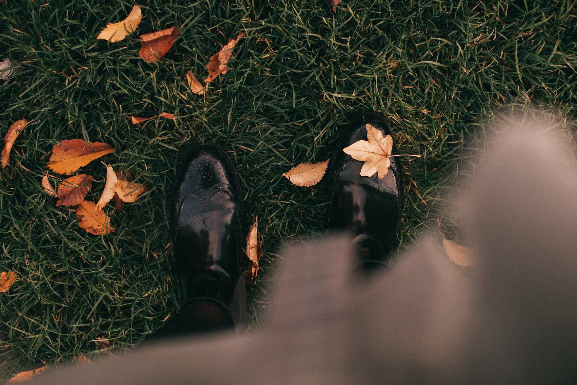 pair of black leather boots