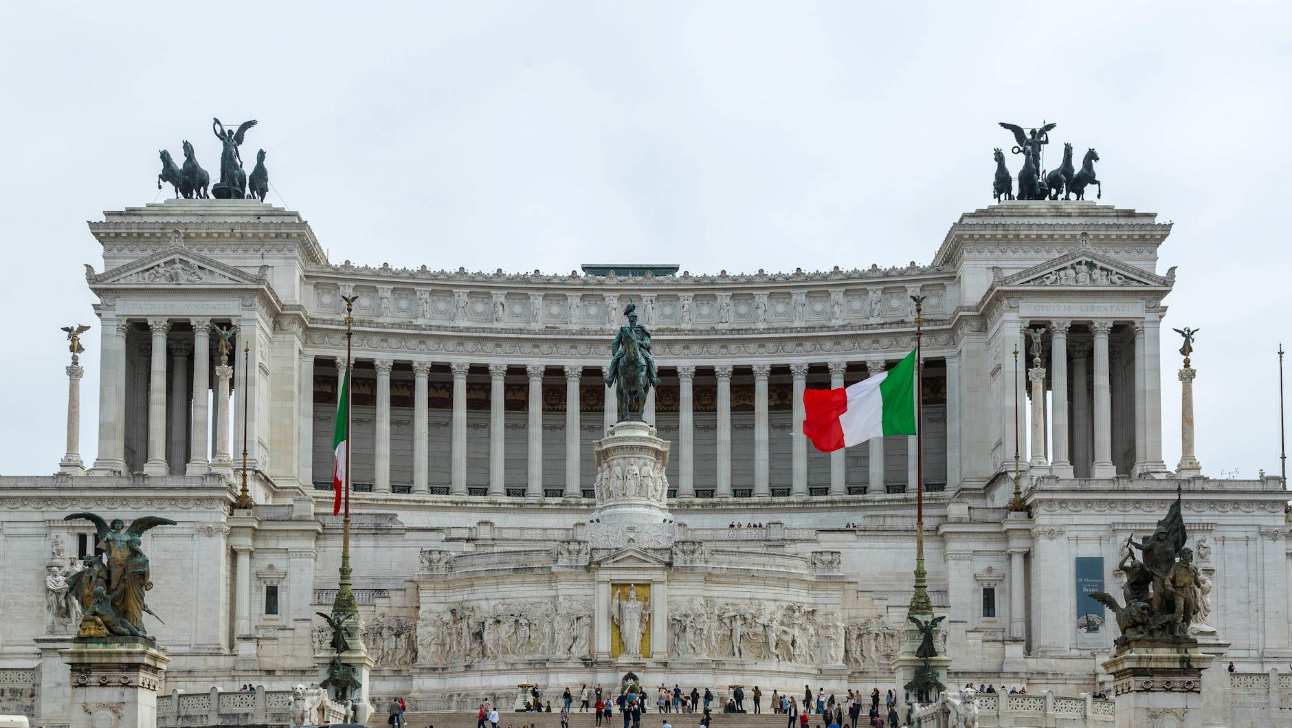 people walking in front of piazza venezia