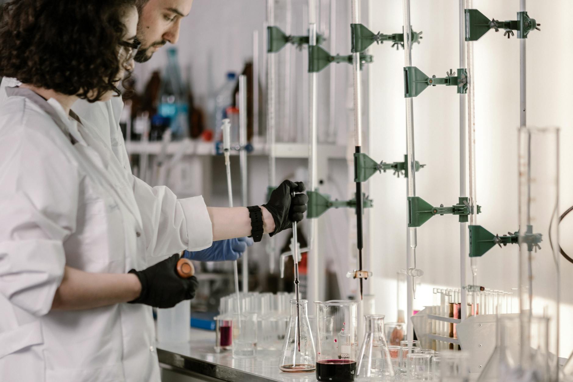 man and woman working in a laboratory