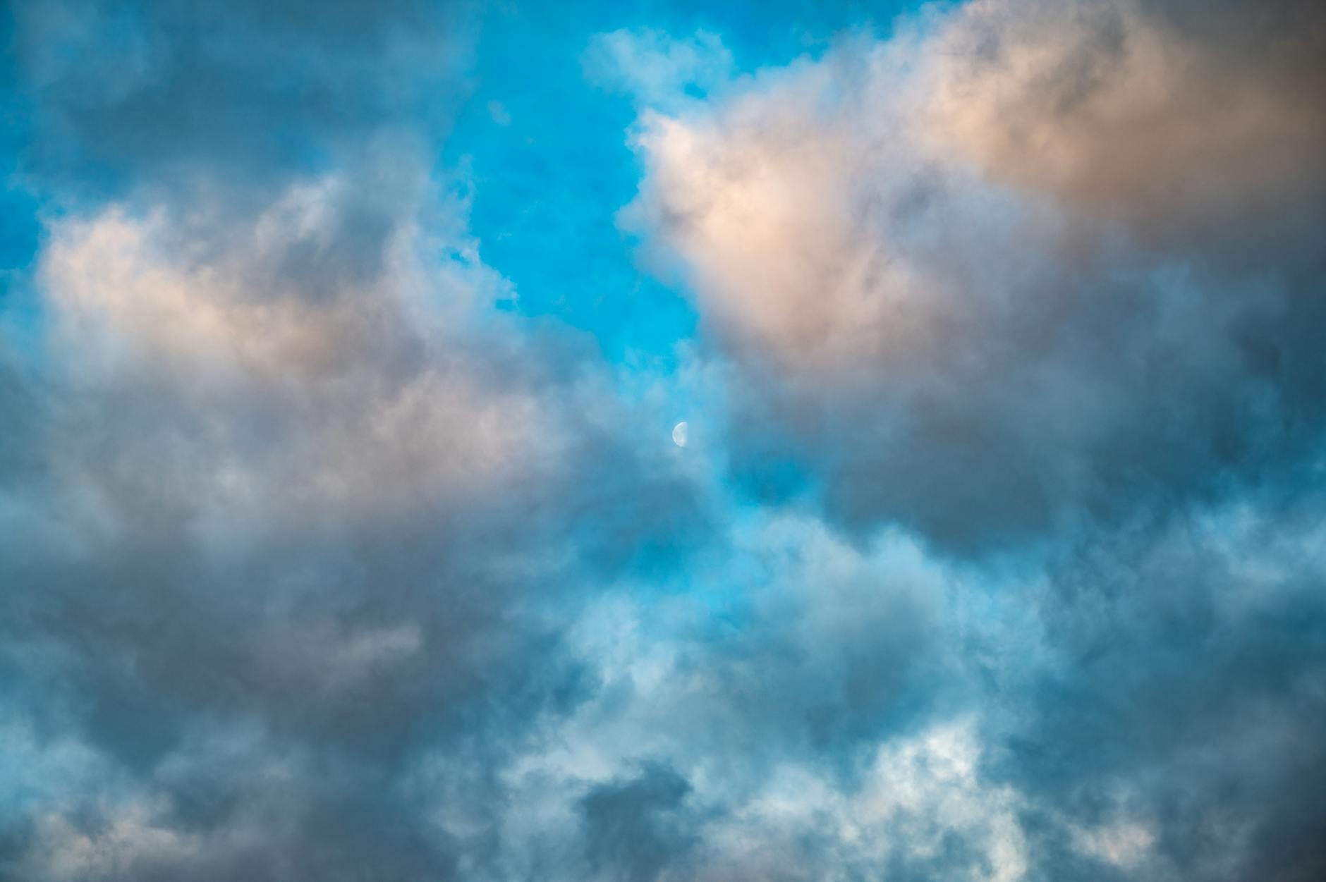 a photo of blue skies above clouds